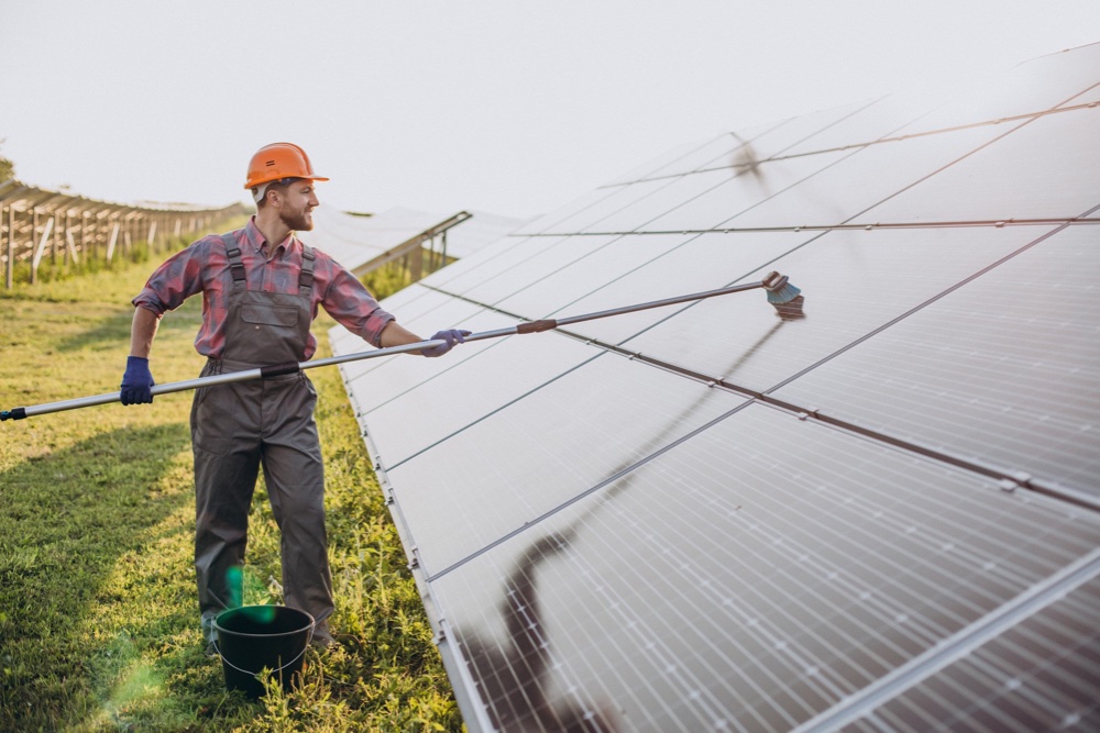 professional cleaning the solar panel 