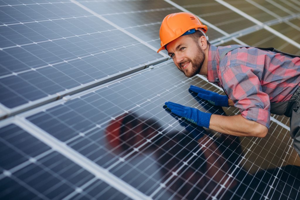 A technical person demonstrating solar panel upgrading process